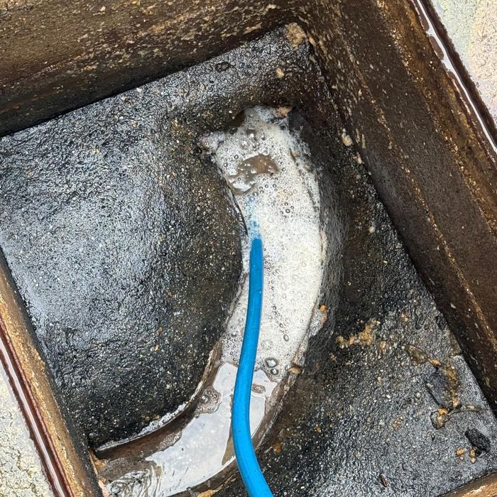 Drain chamber during clearance by the Clean Clear Drains team